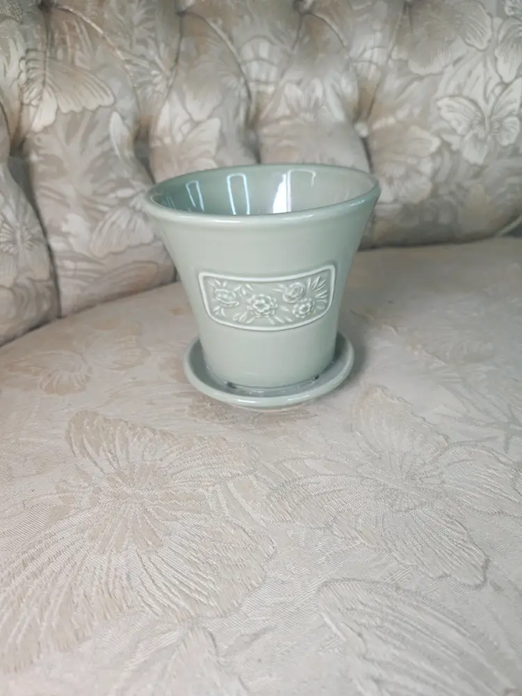 vintage Longaberger 2001 May Series Peony flower pot in sage green with an attached saucer.