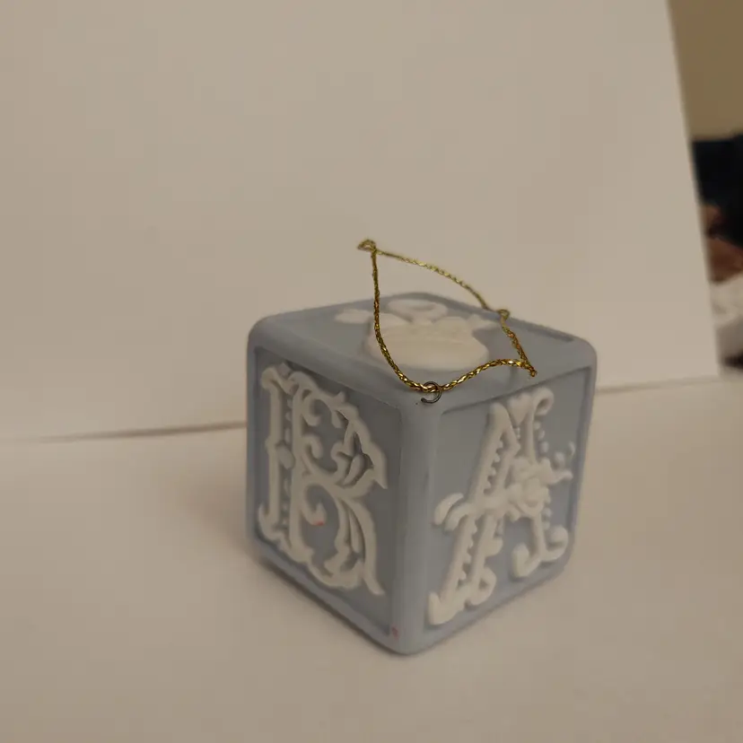 Baby block ornament. Porcelain. Blue and white. 2.25 all around. No damage.