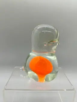 24082 Clear Chonky Bird With Orange Center 4”