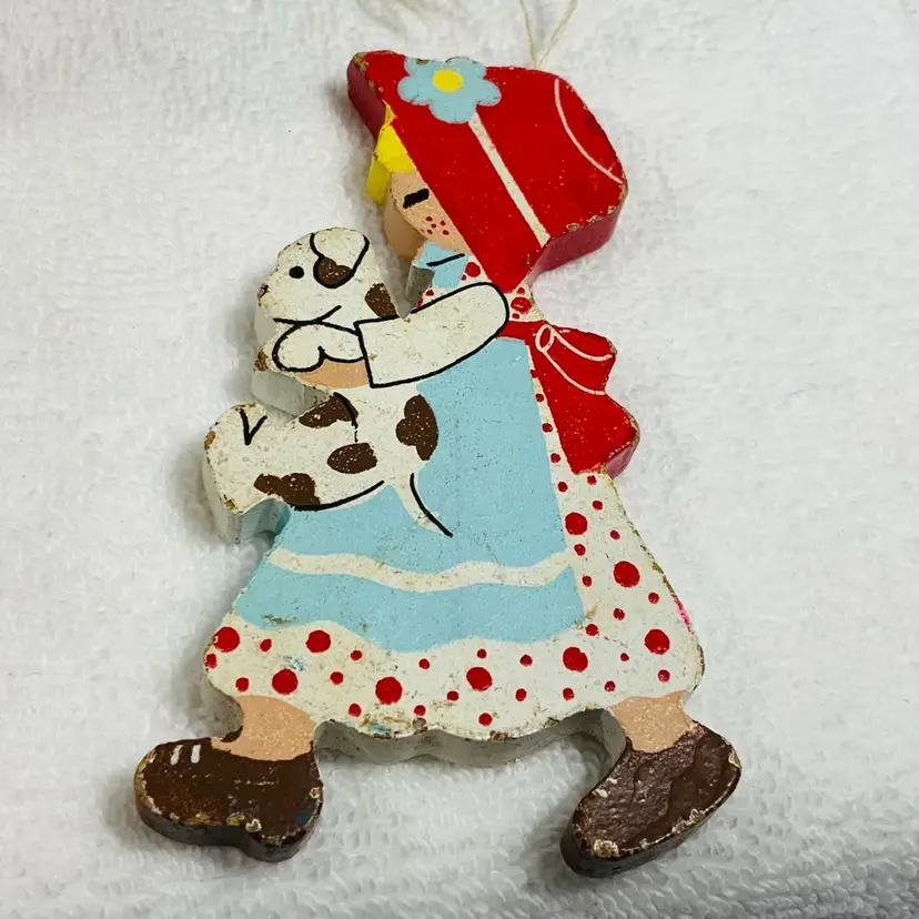 Handmade Wooden Little Girl Wearing A Red Bonnet And Holding A Toy Christmas Ornament Approximately 4” Tall And 2.5” Long Double Sided