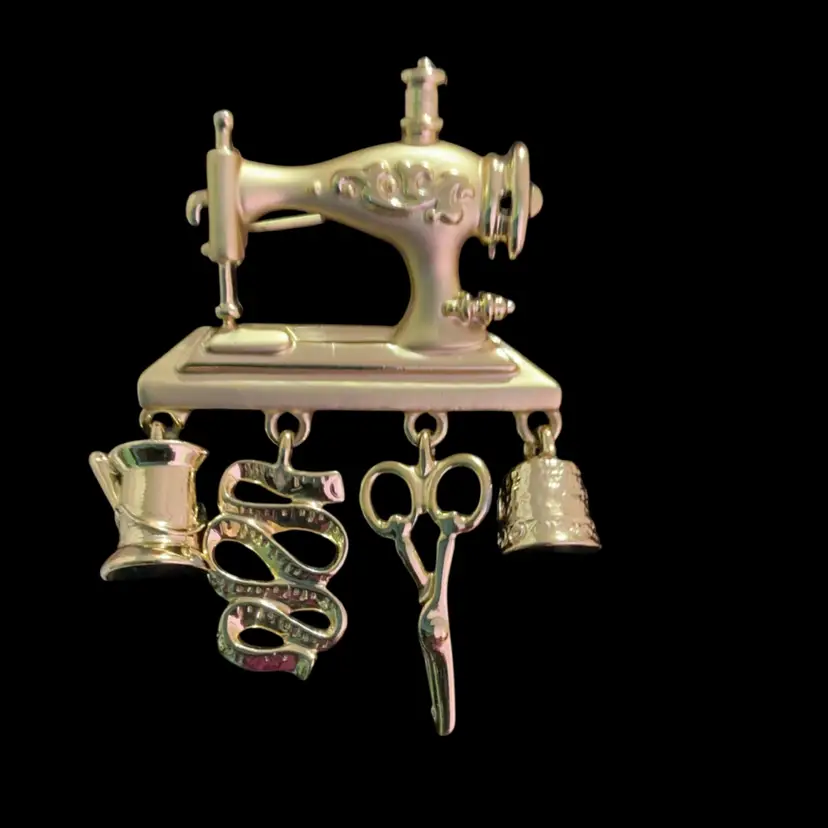 Vintage Brushed Goldtone AJC Sewing Machine Brooch. With Cute Sewing Dangling Charms.