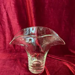 A Beautiful Vintage, clear, hand-blown glass handkerchief vase. 7” Tall 8” Wide.