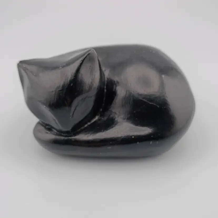 Sleeping cat figurine