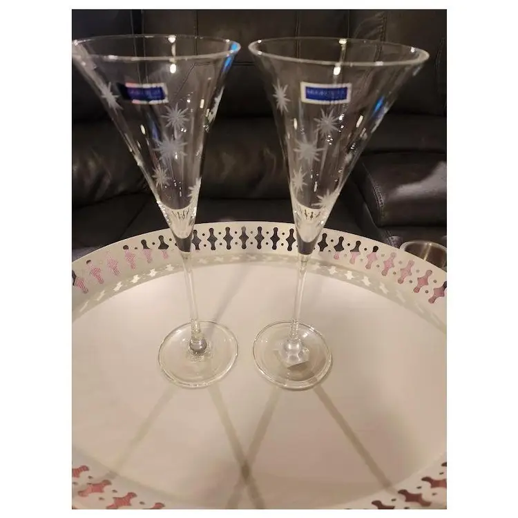 Pair of Marquis By Waterford Crystal "Celebration" Starburst Etched Toasting Flutes