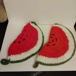 2 crochet watermelon pot holders. 10 inches wide.
