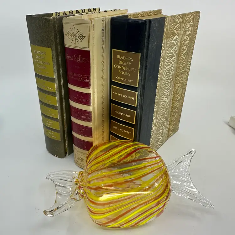 Decorating Vintage Book Stack With Large Glass Candy