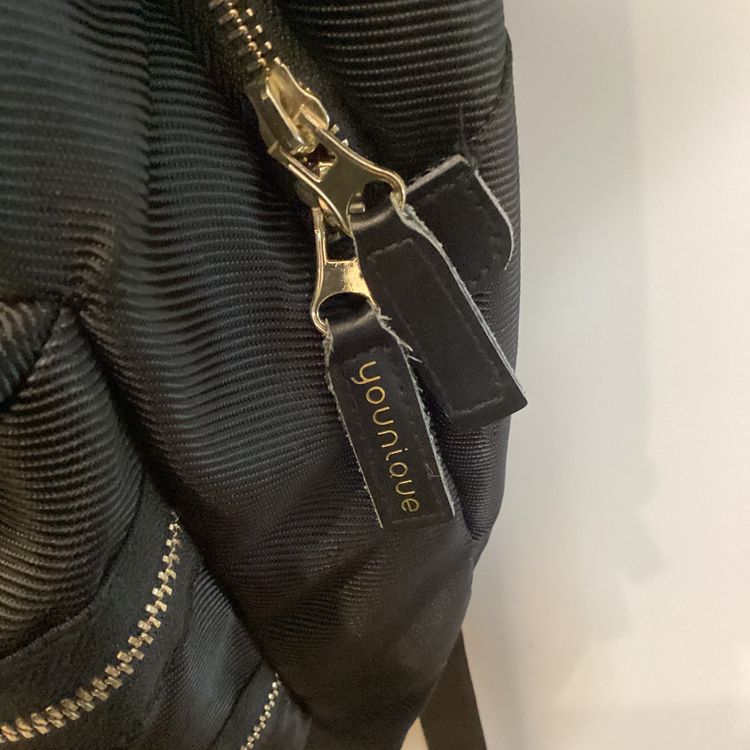 Younique Black Backpack Gold Zipper Accents Purple Interior Travel Bag Cloth