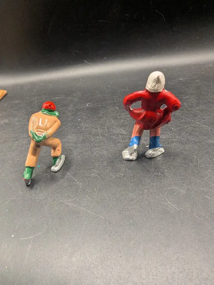 Vintage Set of 2 Barclay Type Metal Hand Painted Skaters Boy and Girl.