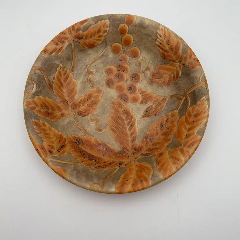 Small Decorative Plate in Light Brown and Orange with grapes/grape leaves