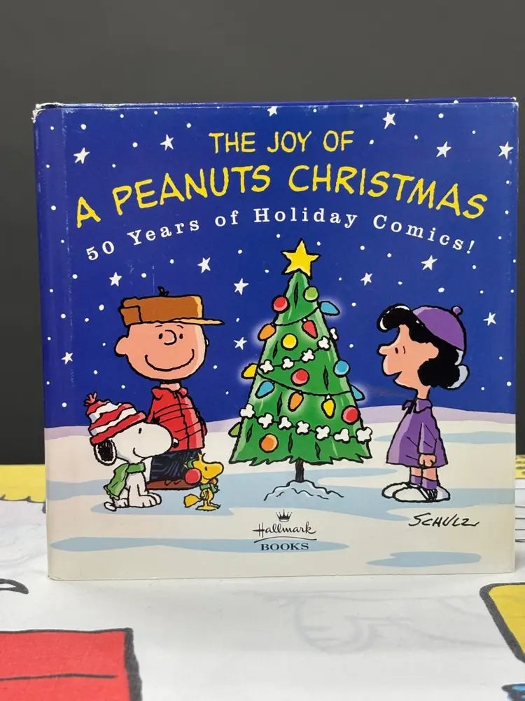 “The Joy of a Peanuts Christmas” Hardcover Book