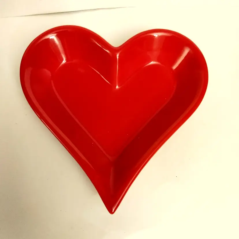 Solid red heart shaped dish. On chips or cracks. 6x6.