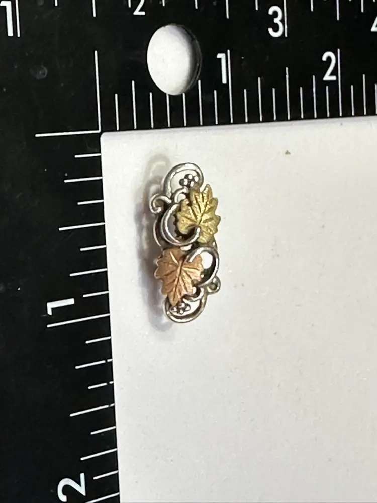 Tri Color Leaves Pendent On Silver toned Bracelet