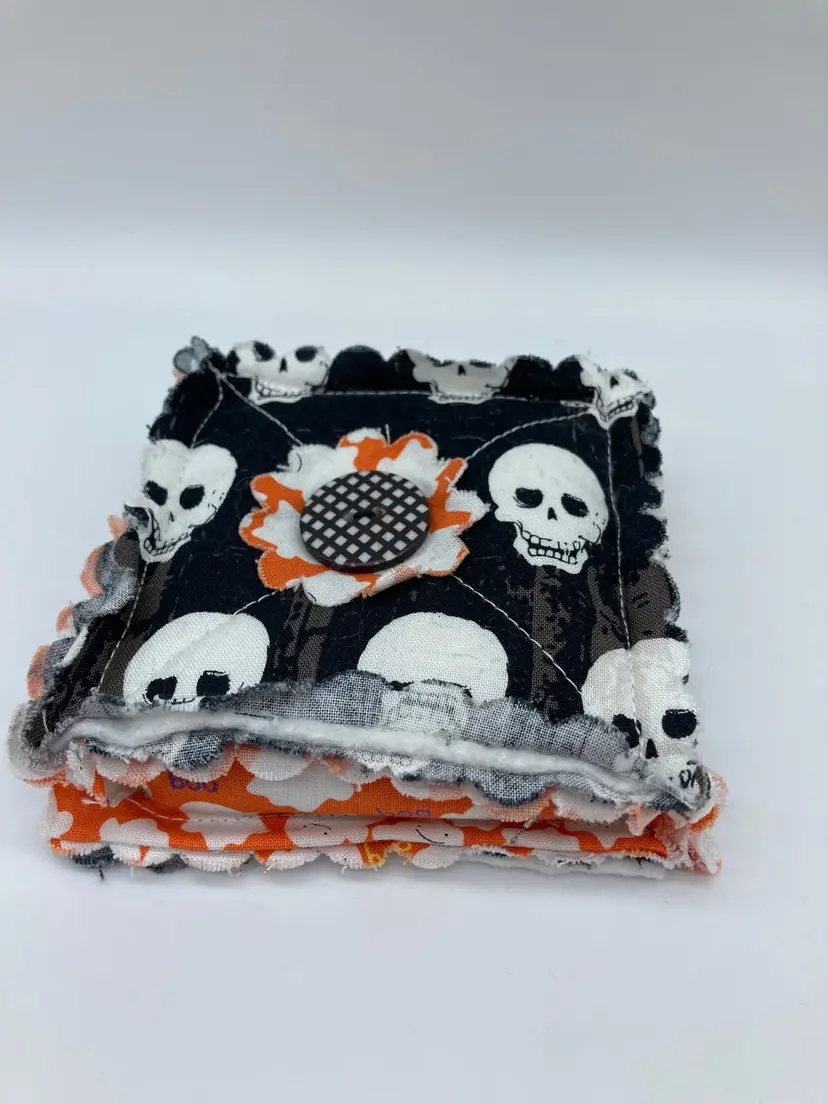 Skeleton cotton cloth pincushion filled with crushed walnut shells