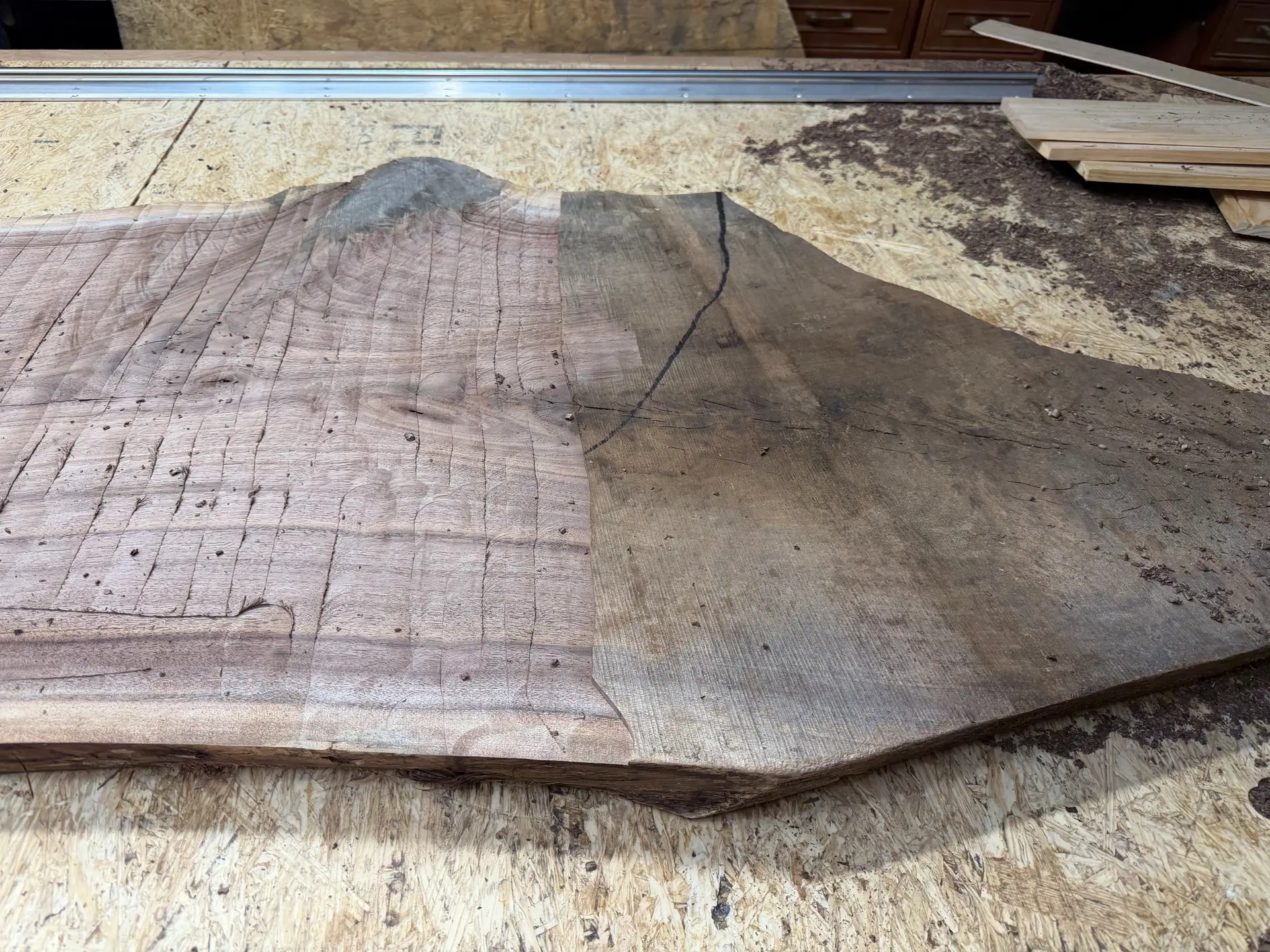 Wood slabs with epoxy lines in the workshop