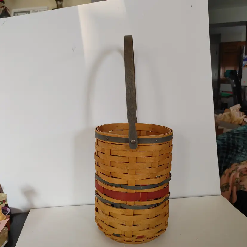Longaberger basket. As is. Signed and dated 2008. 1 broken spot in the weave. See pics. 6w x 8.25h x 6d. Handle is additional 7.5 inches.