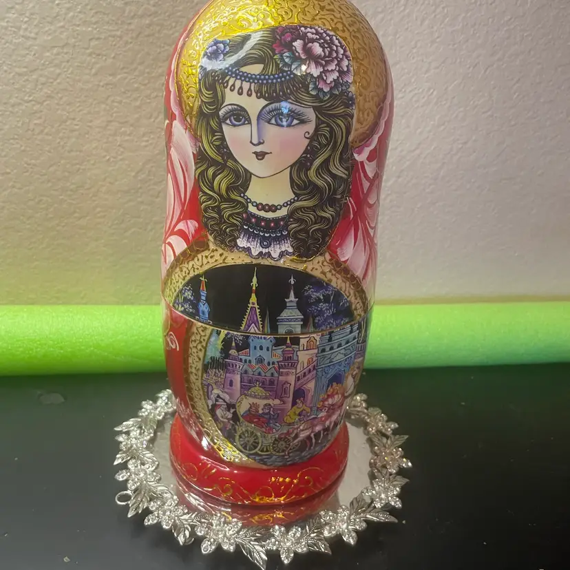 Gorgeous Matryoshka Folk Art Russia 11” Lacquered Nesting Dolls Figurine. 
There are 10 Nesting Dolls with Assorted Colors