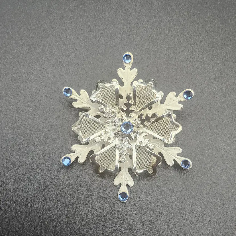 Vintage Silver Snowflake Brooch with Blue Rhinestones