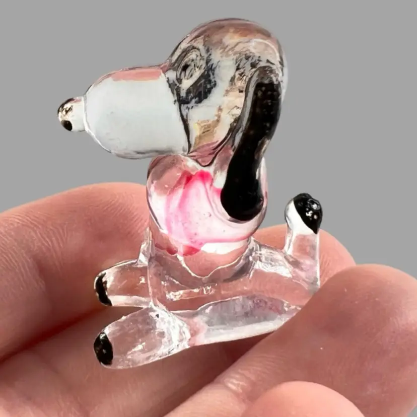 Miniature Snoopy Peanuts Plastic Figurine. Wearing A Pink Shirt. Stamped “Hong Kong” On Side Base. Vintage Knick-Knack Trinket Tchotchke.