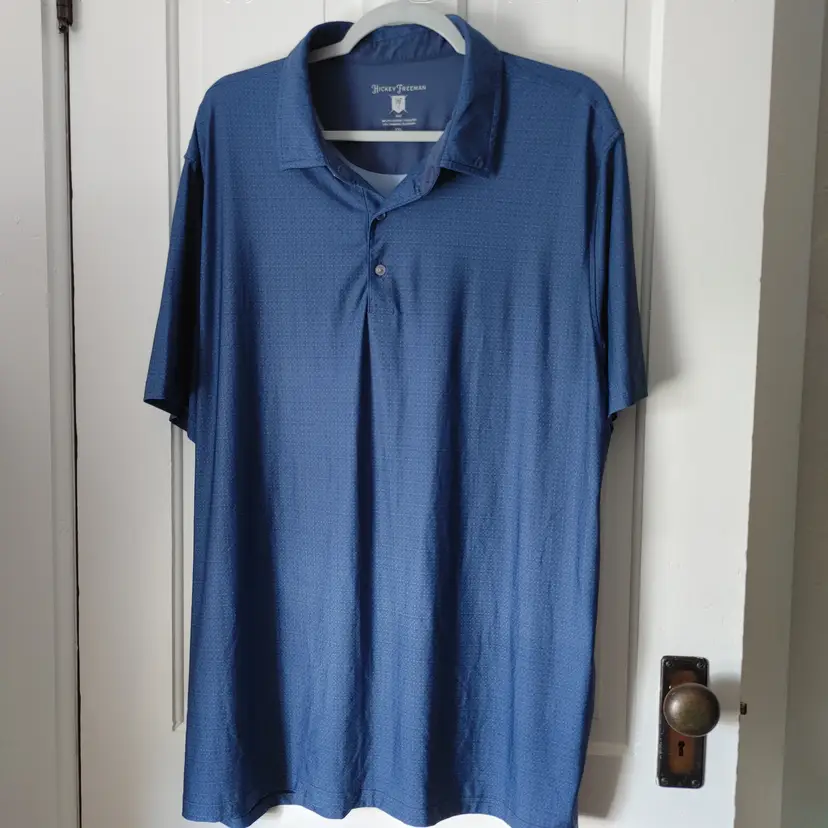 Men's Top- Brand: Hickey Freeman Golf. Size 2X. Blue top. Material: 88% polyester, 12% spandex. No condition issues.