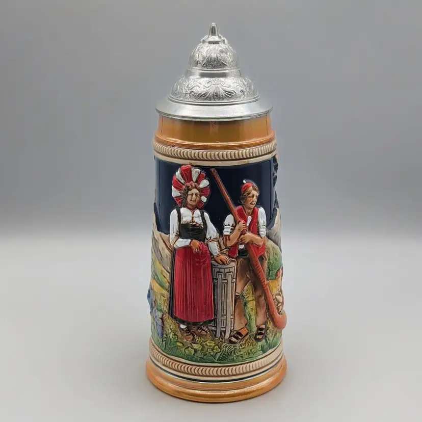 Vtg Beer Stein Relief of a Man with Alphorn and Woman Traditional German Attire