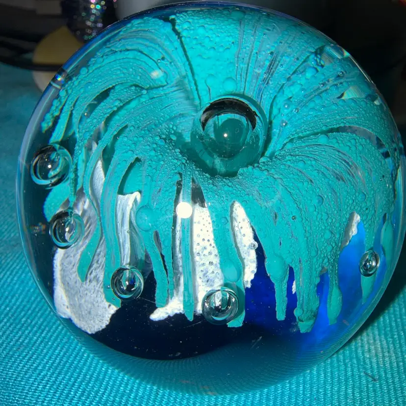 #33… Art Glass Paperweight with White Flower, Blue Base and Controlled Bubbles