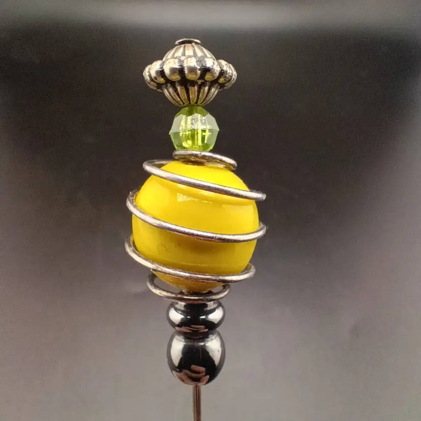 Yellow and green hatpin