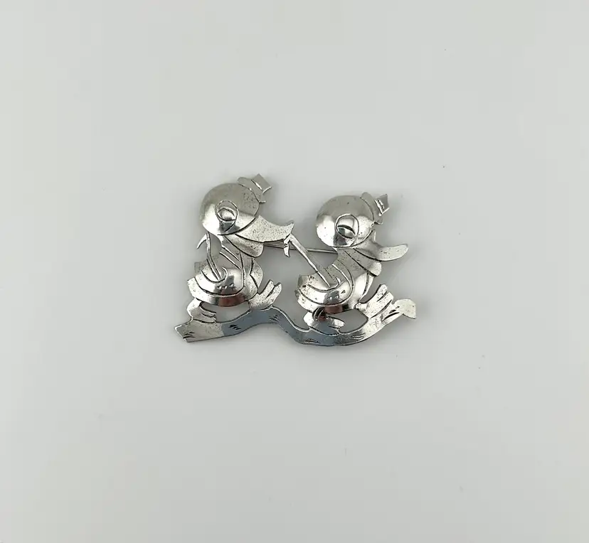 Silver Ducks With Umbrellas Brooch