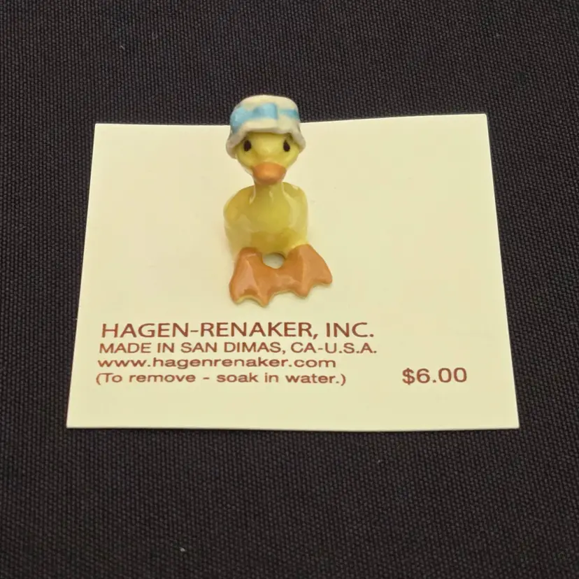 Retired Hagen-Renaker Ceramic Sister Goose In Bonnet - original card with original price sticker