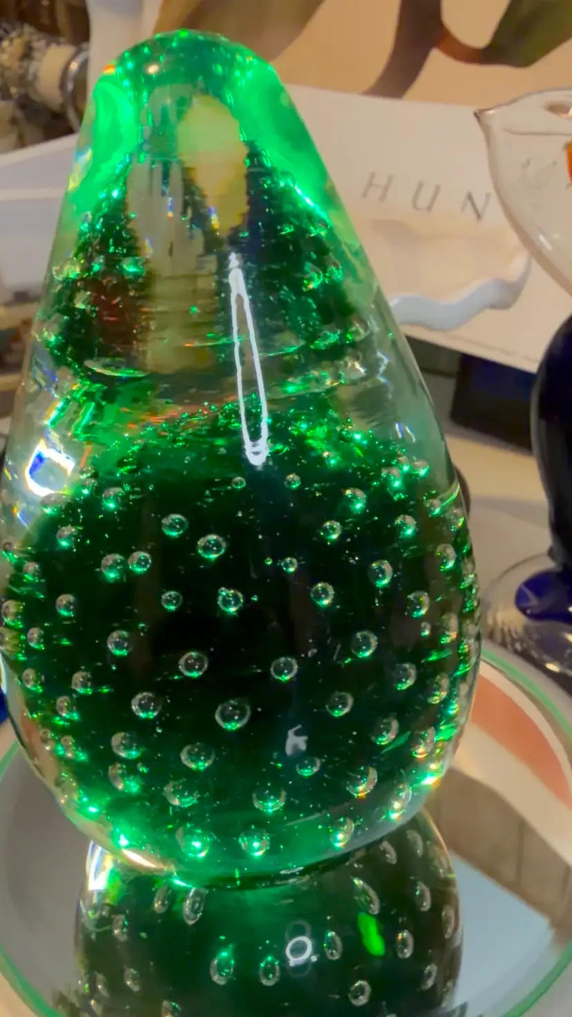 19… Green teardrop art glass paperweight with controlled bubbles.