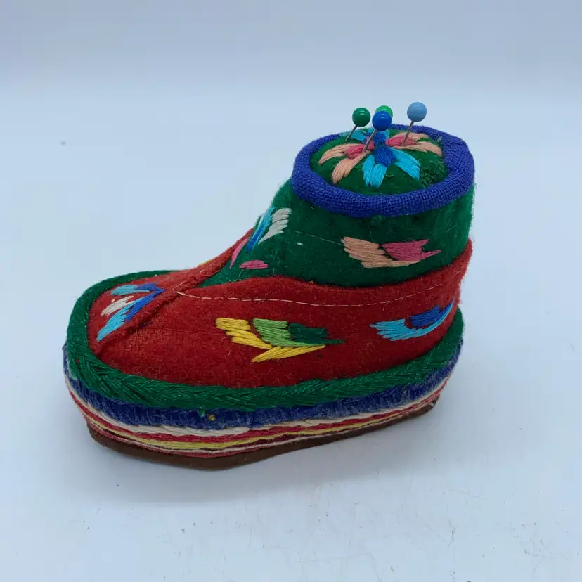 Nepalese Handmade felt decorative shoe pincushion with colorful embroidery.