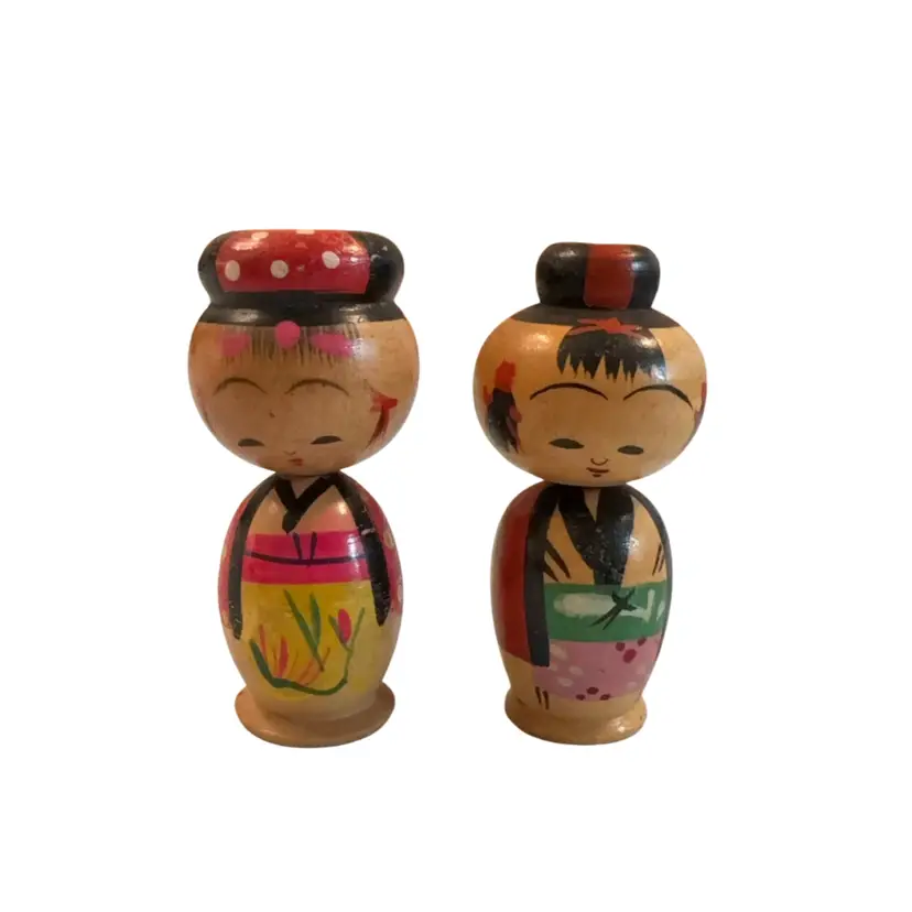 2 Vintage Japanese wood nodder Kokeshi dolls, specifically recognized for having heads that wobble or turn. 1 3/4” Tall Both Are Wearing Hats