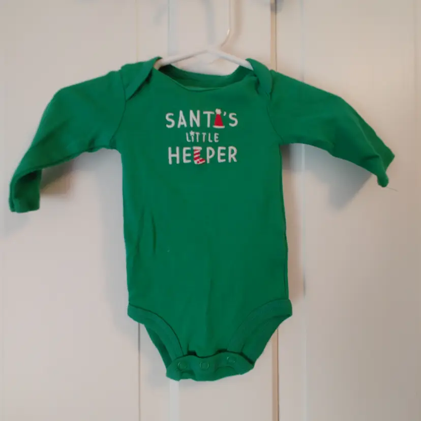 Kids- Brand: Carter's- Just One You. Size Newborn. Green onesie- Santa's Little Helper. Material- 100% cotton. No callouts.