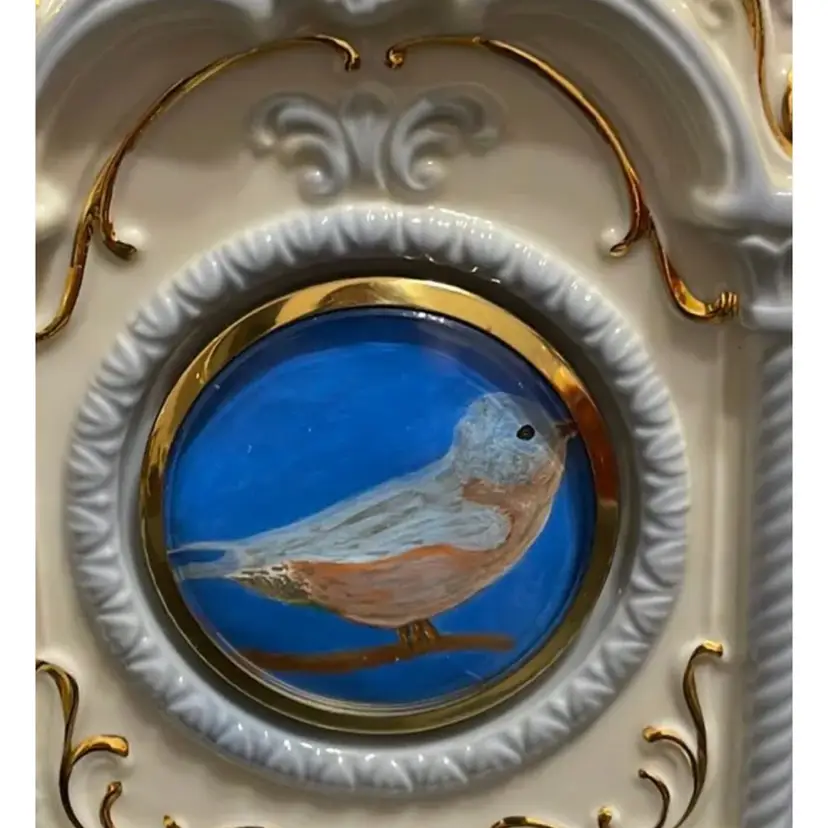 Bird In Clock