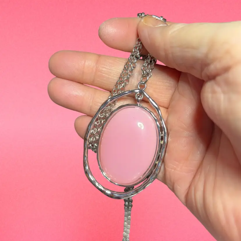 29 Inch Silvertone Chain With A A Pendant That Has A Pink Acrylic Stone In It