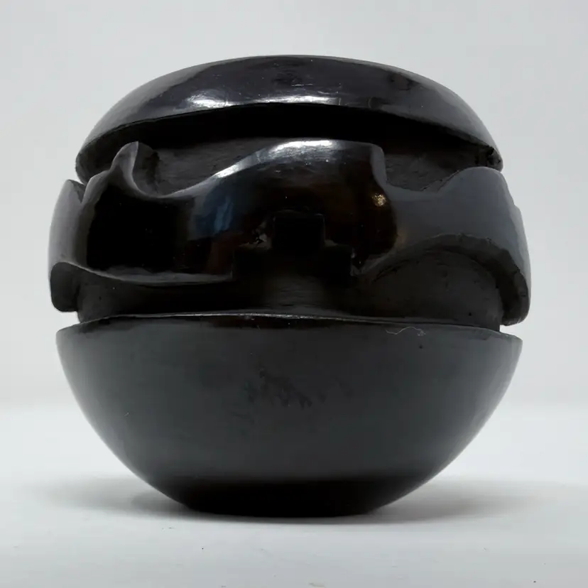Traditional Santa Clara Carved Polished Blackware Pottery Bowl Signed By Marvin and Delores Moquino .