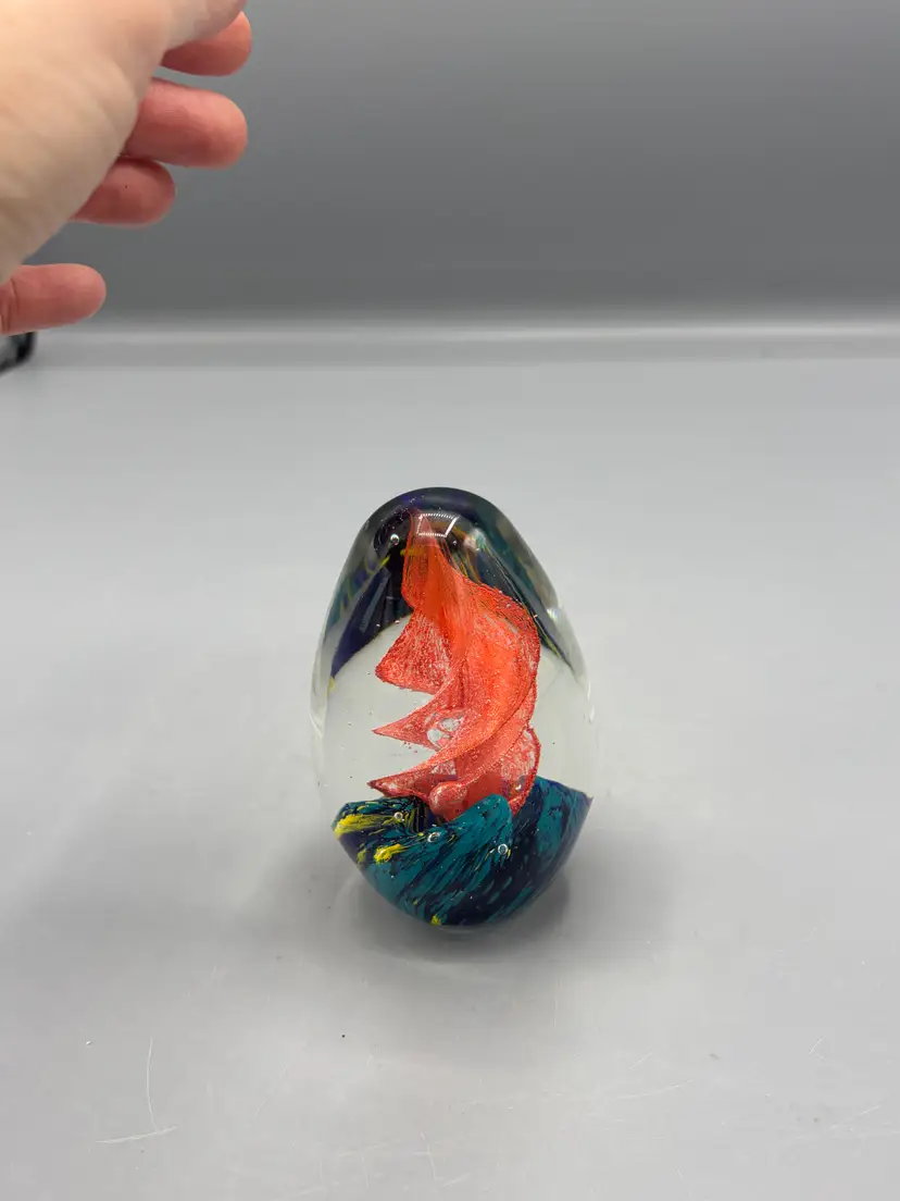 Art glass  egg with red swirl