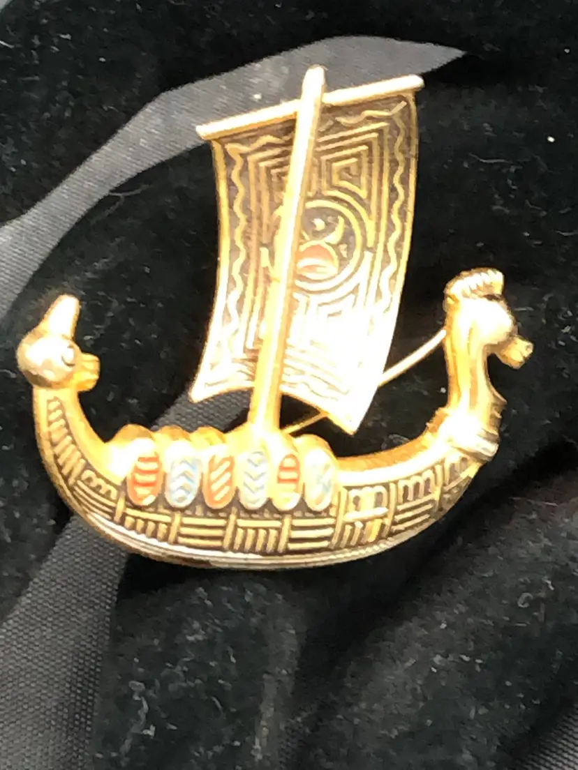 Vintage faux Damascene Viking ship brooch
