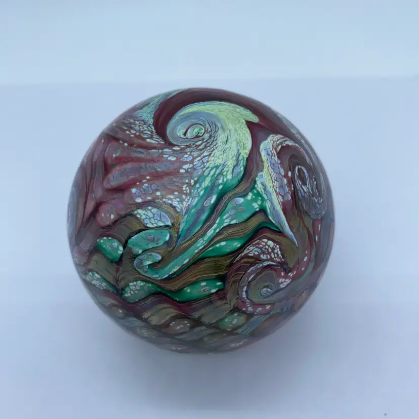 #0081 An original Isle of Wight studio glass paperweight with label.