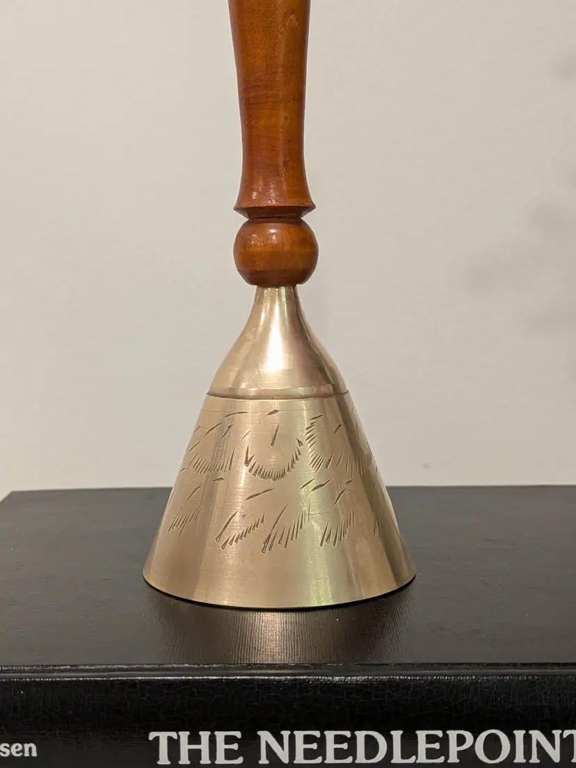 Vintage etched brass hand bell with wood handle
