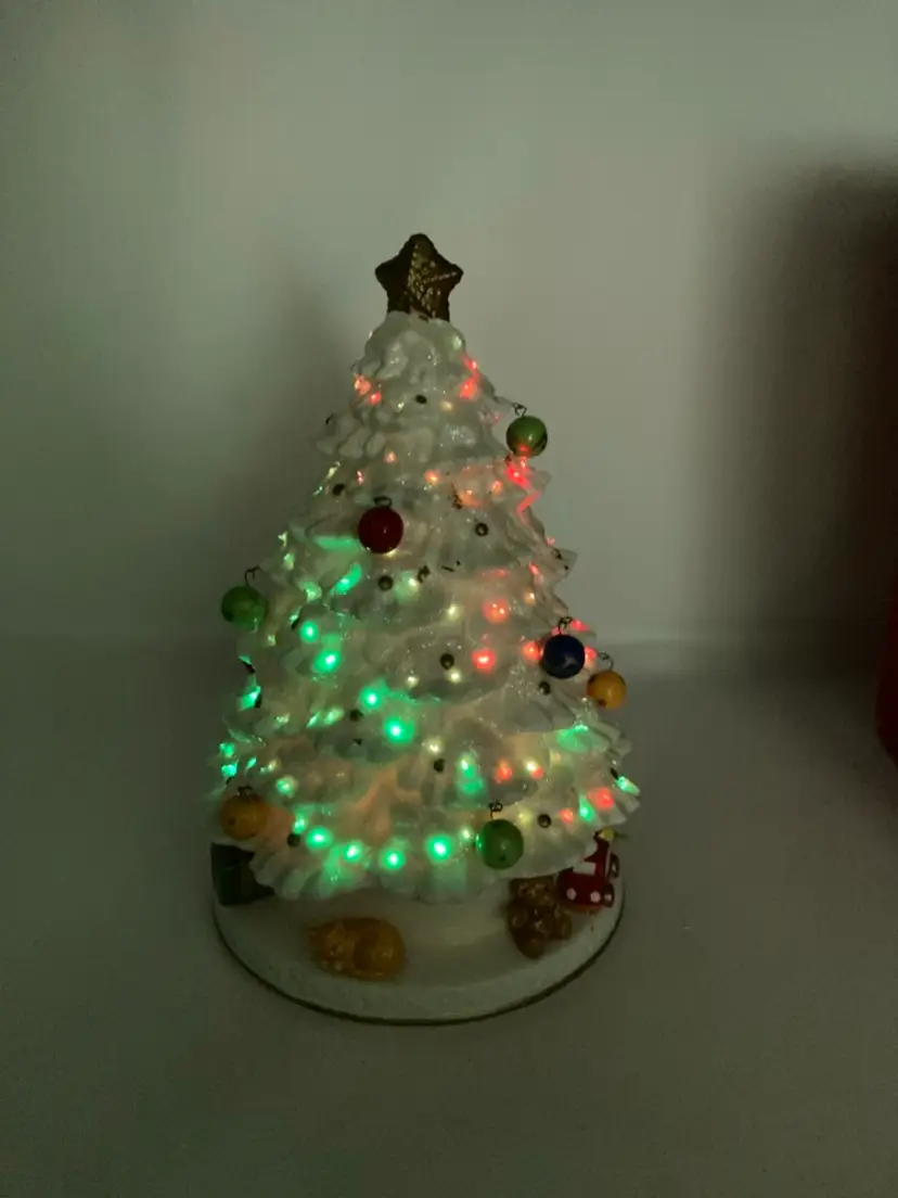 Fiber Optic Porcelain Tree With Wind Up Music! 9 3/4” Tall! Plays “We Wish You A Merry Christmas”! READ! 1 Removable Ornament Missing And Batteries NOT Included! Requires 3 AAA Batteries!