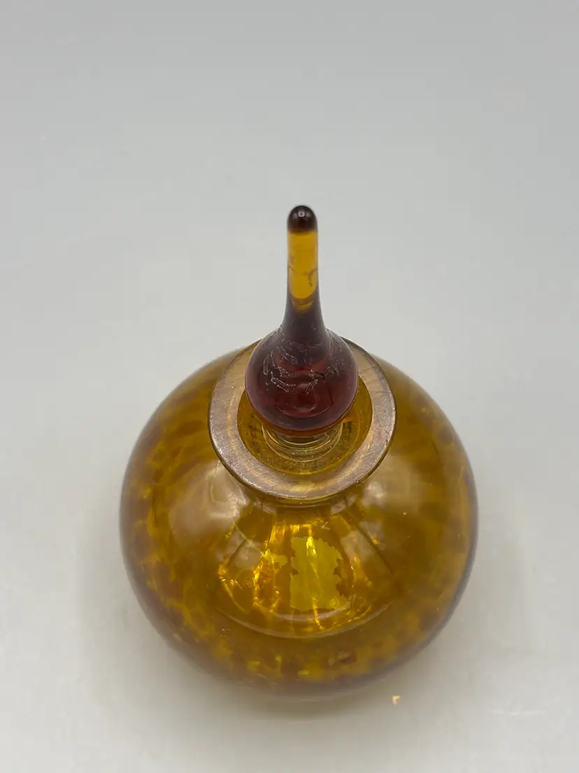 Brown perfume bottle with stopper