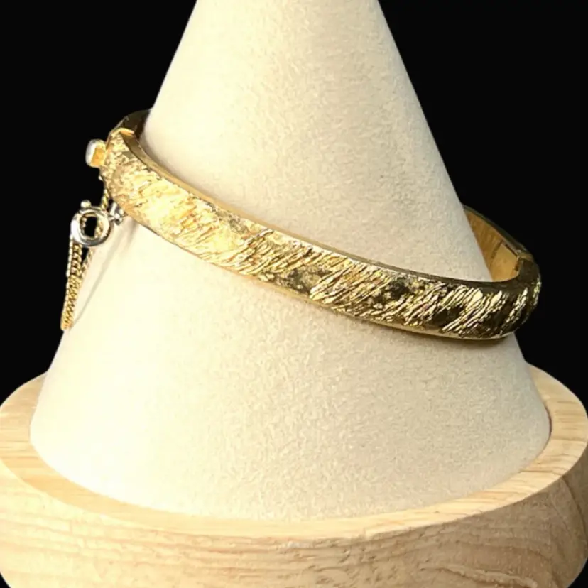 6-3/4” Crown Trifari 👑 Oval Bracelet. Gold-tone Metal. Hinged & Safety Chain.