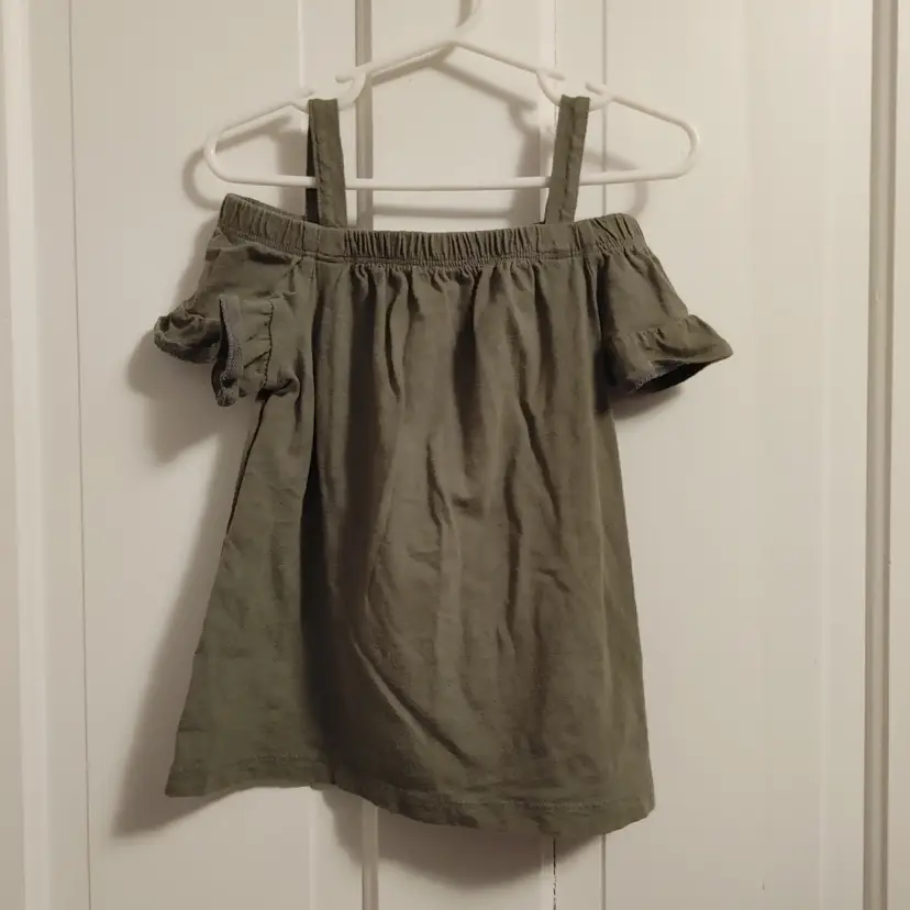 Kids- Brand: Carters Kids. Size 4/5. Olive green cold shoulder shirt. Material- 100% cotton. No callouts.