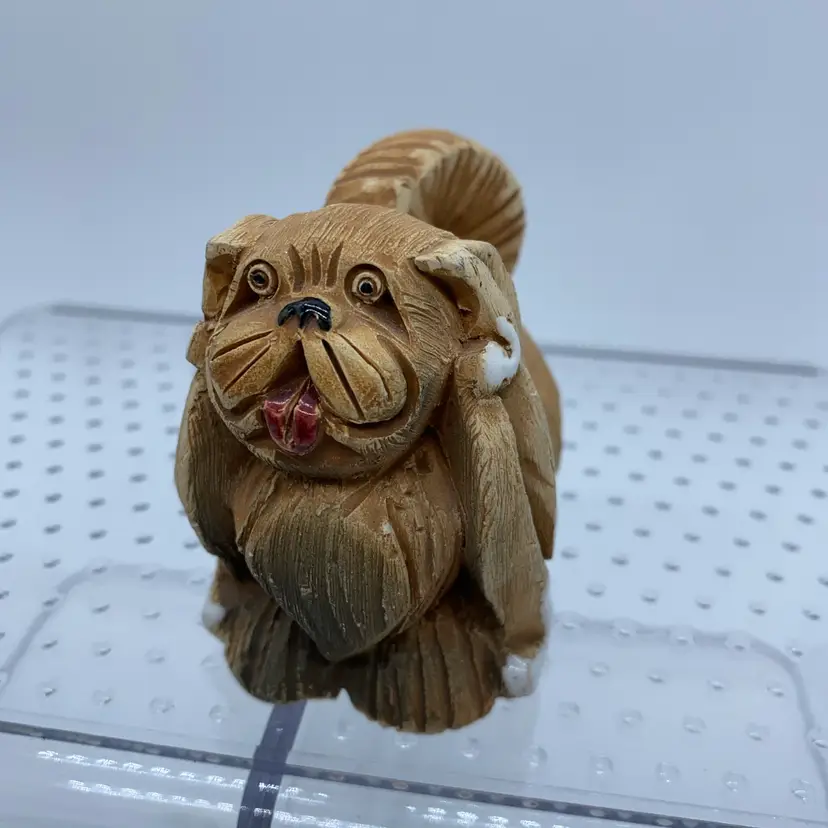 #3064 Handcrafted Artesania Rinconada Pekingese dog figurine.