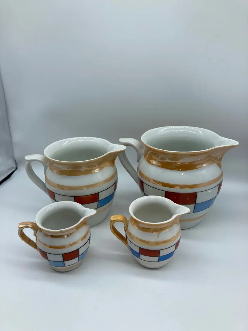 RK & G (Rudolf Kämpf, Grünlas), Union K (Union Porzellanfabrik, Klösterle) pitcher and creamer set