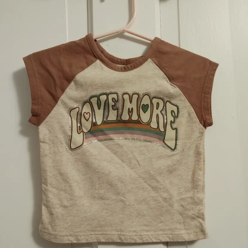 Kids- Brand: Garanimals. Size 18 Months. Love More tee. Material- 60% cotton, 40% polyester. No callouts.