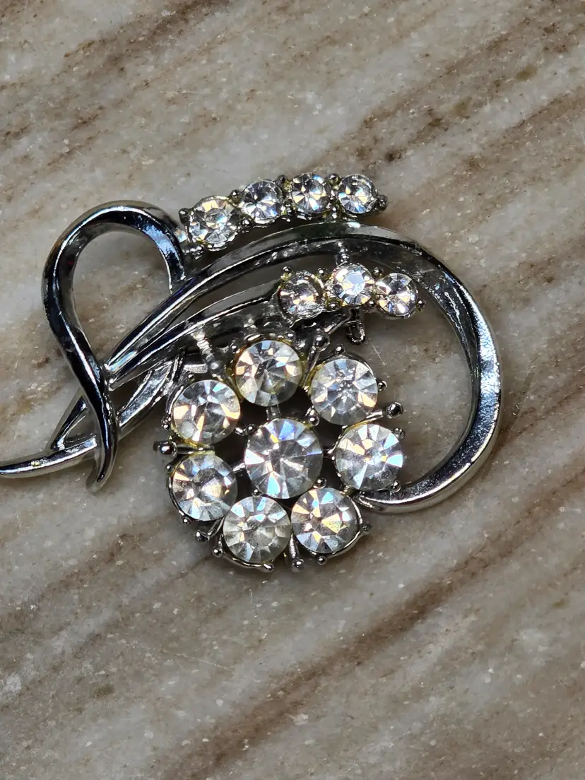 #75 Vintage Coro Clear Rhinestone Silver Tone Swirl Brooch