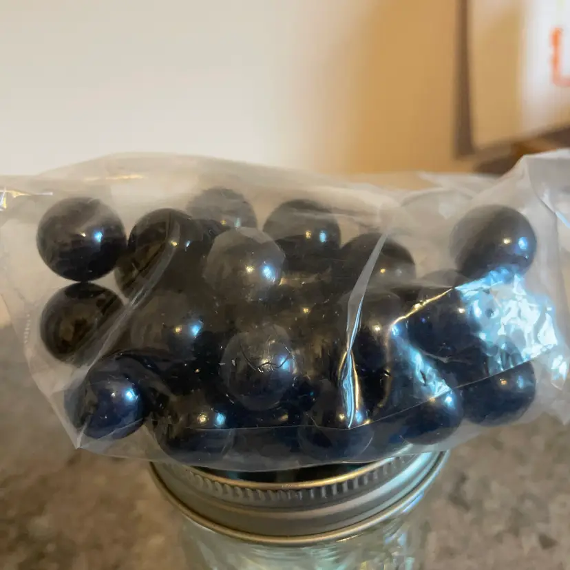 29 Solid Black Marbles