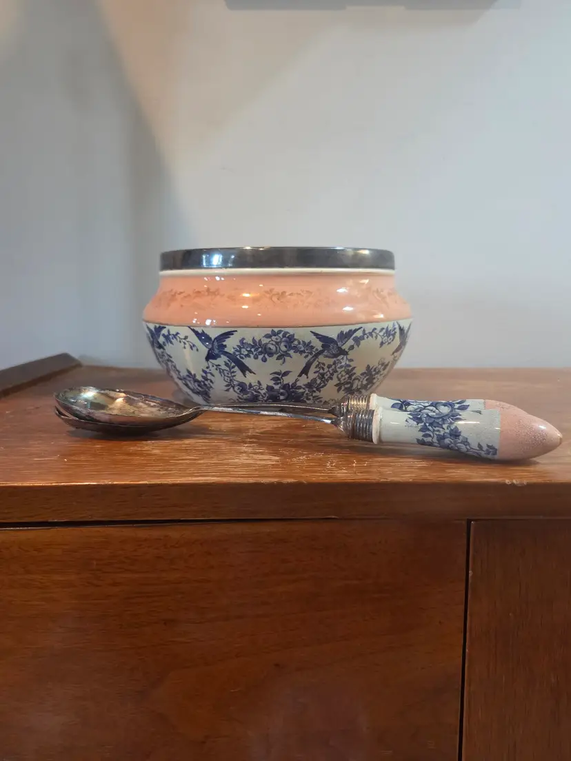 Victorian bowl with servicing utensils that match.  Silver plated.