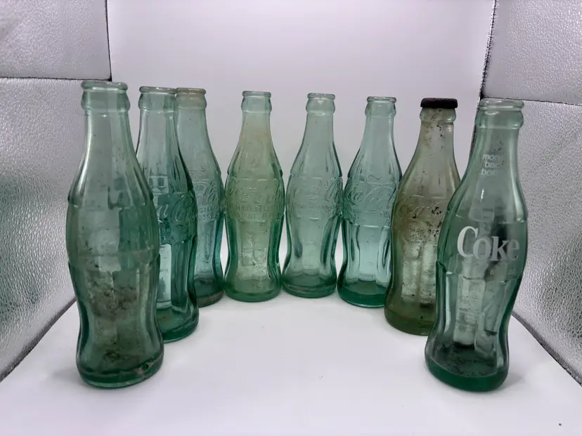 8 Vintage Hobbleskirt Coca Cola bottles